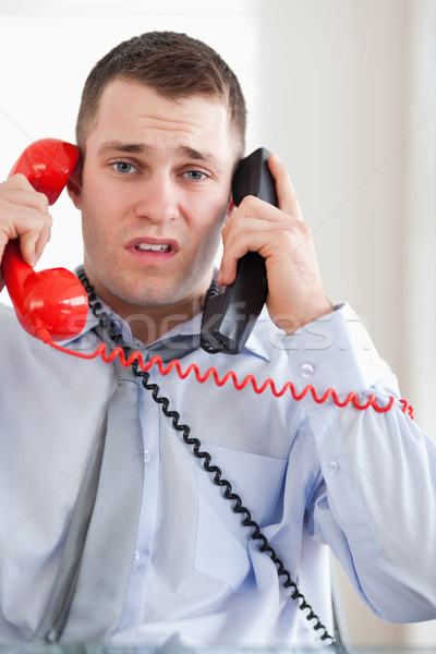 Close up of stressed businessman troubled by the telephone Stock photo © wavebreak_media
