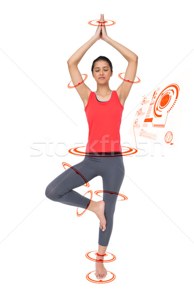 Composite image of full length of a fit woman standing in tree p Stock photo © wavebreak_media