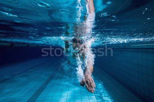 Fit swimmer training by himself Stock photo © wavebreak_media