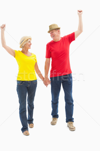 Mature couple walking and holding hands Stock photo © wavebreak_media