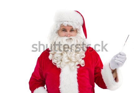 Pretty santa girl blowing over hand Stock photo © wavebreak_media