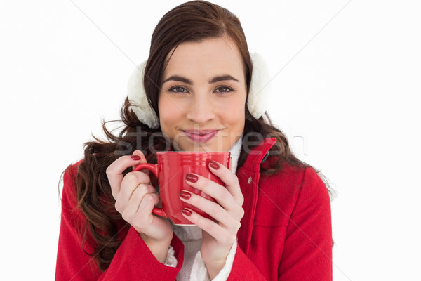 Woman in winter clothes enjoying a hot drink Stock photo © wavebreak_media