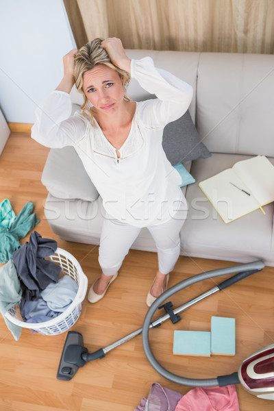 Fáradt szőke nő takarítás kaotikus nappali otthon Stock fotó © wavebreak_media