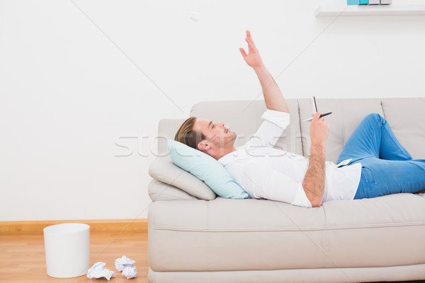 Adam düşünme kanepe yazar ev oturma odası Stok fotoğraf © wavebreak_media