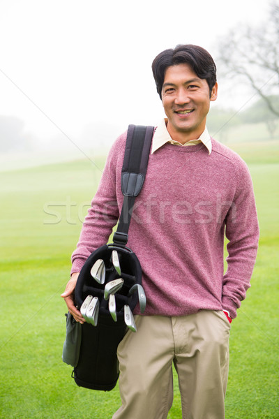 Golfista piedi sacca da golf sorridere fotocamera Foto d'archivio © wavebreak_media