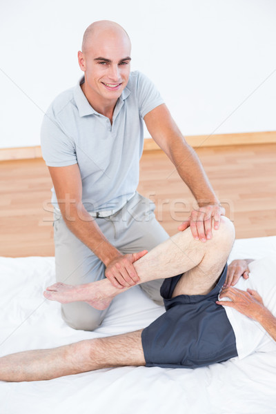 Stock photo: Man having leg massage 