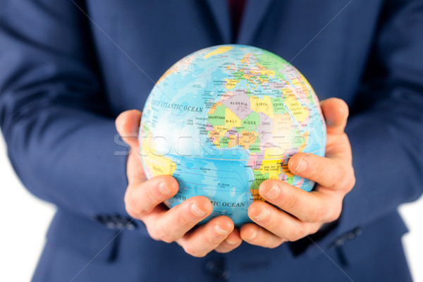Hand of businessman holding terrestrial globe  Stock photo © wavebreak_media