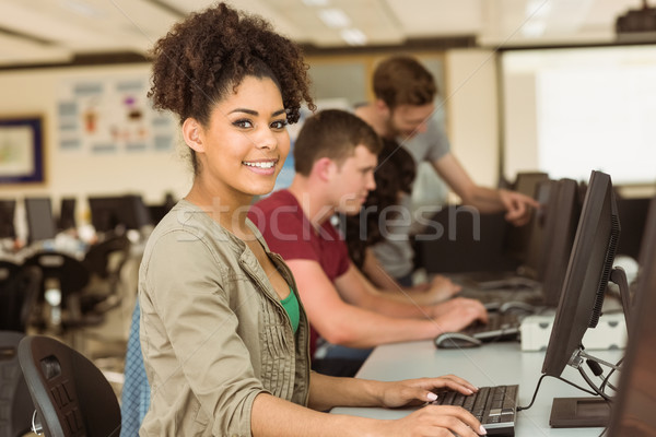 Classmates working in the computer room Stock photo © wavebreak_media