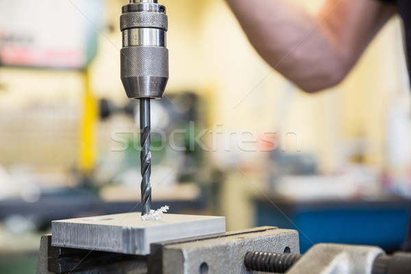 Engineering student using large drill Stock photo © wavebreak_media