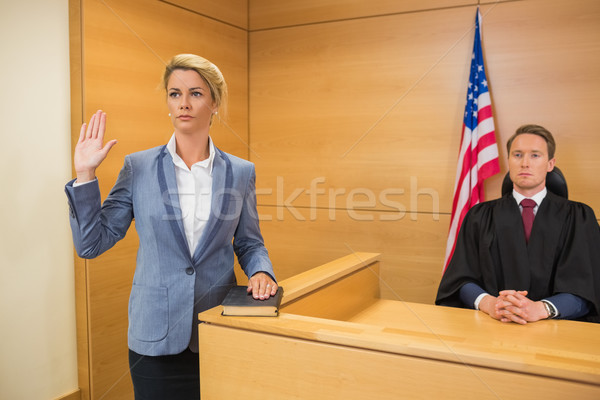 Witness taking an oath Stock photo © wavebreak_media