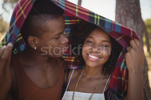 Close up of smiling couple in blanket Stock photo © wavebreak_media