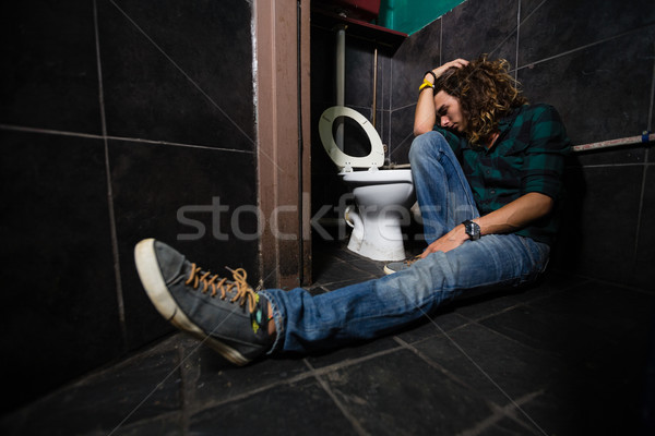 Férfi alszik illemhely eszméletlen bár wc Stock fotó © wavebreak_media