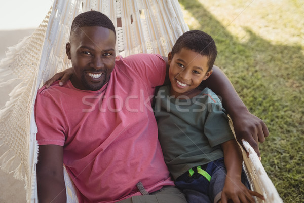 微笑 父親的兒子 放寬 吊床 肖像 花園 商業照片 © wavebreak_media