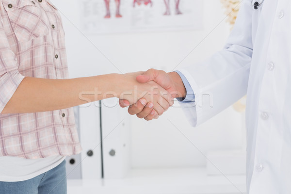 Patient shaking hands with doctor Stock photo © wavebreak_media