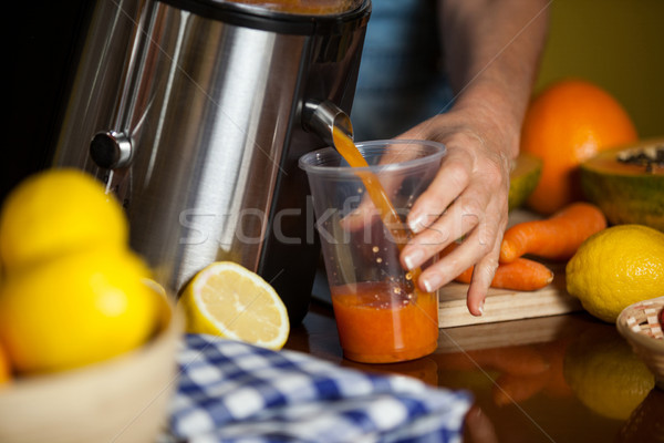 Female staff preparing a juice Stock photo © wavebreak_media