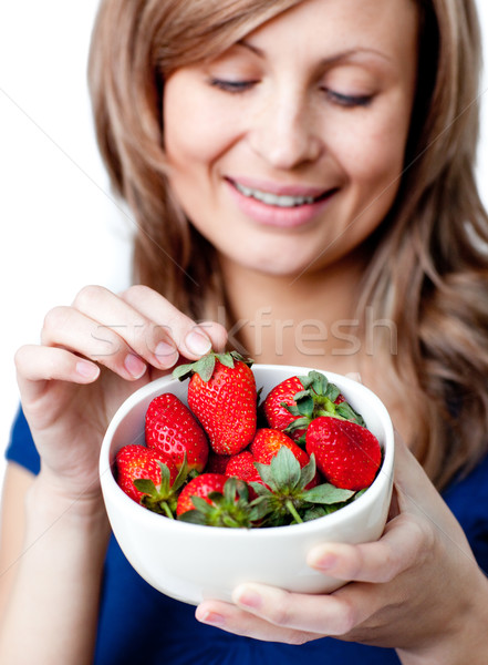 Caucásico mujer comer fresas blanco feliz Foto stock © wavebreak_media