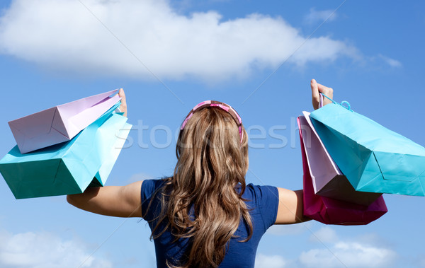 Happy woman holding shopping bags outdoor  Stock photo © wavebreak_media