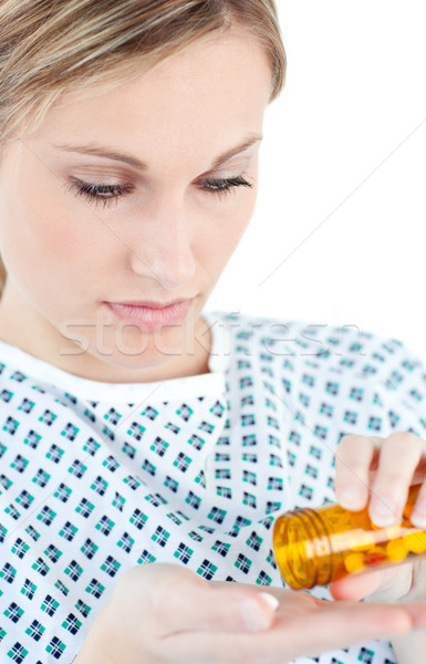 Mujer toma pastillas blanco sonrisa médicos Foto stock © wavebreak_media