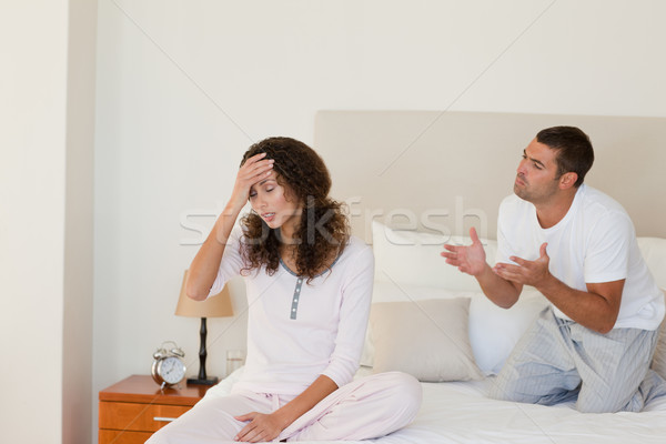 Young couple having a dispute on the bed at home Stock photo © wavebreak_media