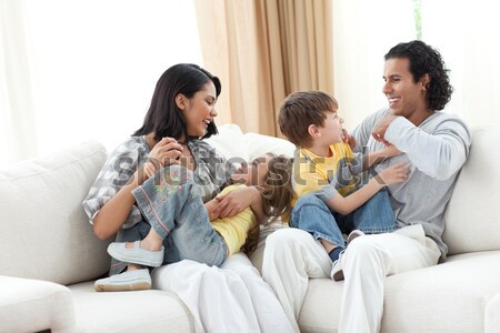 Genç aile kanepe bakıyor birlikte Stok fotoğraf © wavebreak_media