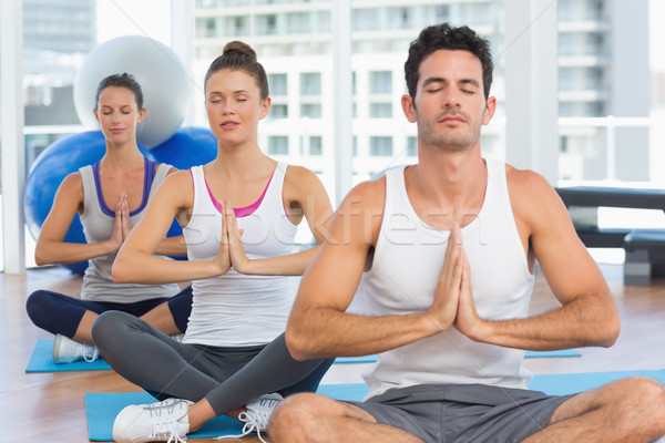 Jongeren namaste pose drie Stockfoto © wavebreak_media
