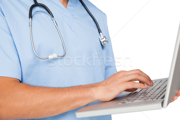 Közelkép középső rész férfi sebész laptopot használ fehér Stock fotó © wavebreak_media