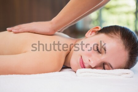 Attractive woman receiving head massage at spa center Stock photo © wavebreak_media