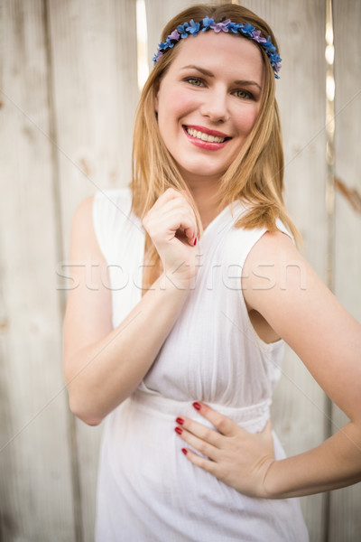 Portrait of a smiling blonde woman wearing headband Stock photo © wavebreak_media