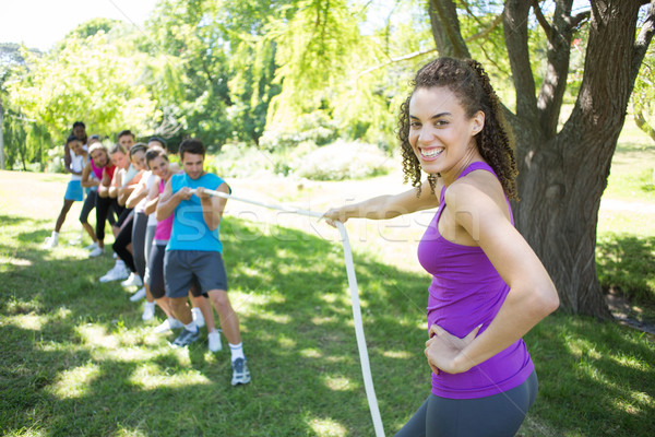 Fitness group playing tug of war Stock photo © wavebreak_media