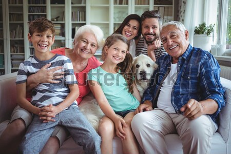Parents and children on rug with labrador Stock photo © wavebreak_media