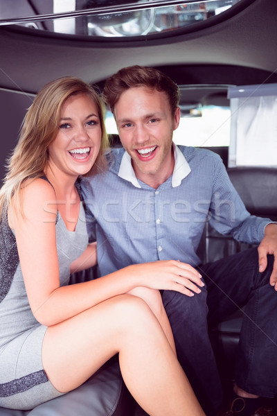 Happy couple smiling in limousine Stock photo © wavebreak_media