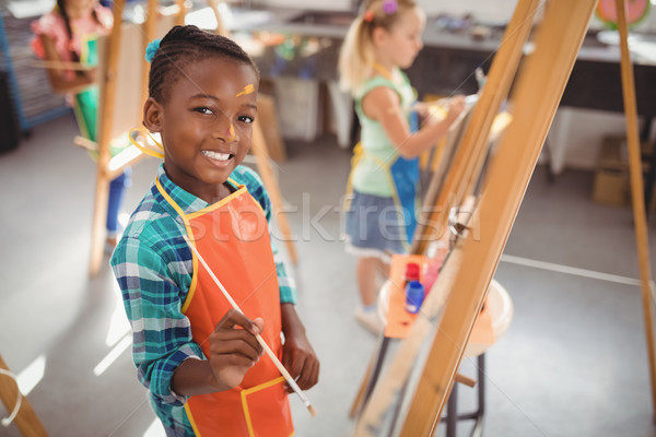 Portré mosolyog lány zihálás vászon rajz Stock fotó © wavebreak_media