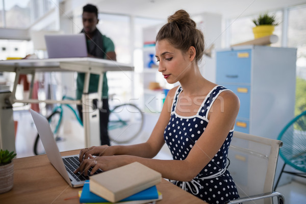 Homme exécutif travail portable bureau bureau [[stock_photo]] © wavebreak_media