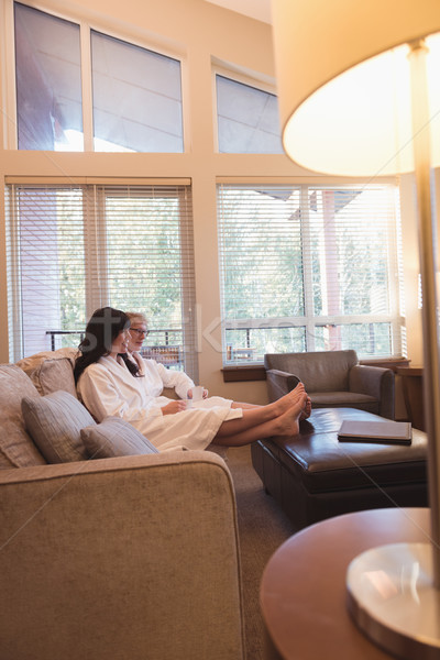 Couple relaxing while having coffee in the living room Stock photo © wavebreak_media