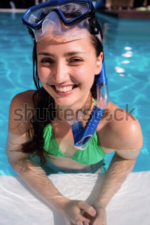 Woman wearing a snorkeling equipment Stock photo © wavebreak_media