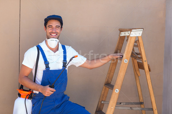 Portrait of pesticide worker standing by ladder Stock photo © wavebreak_media