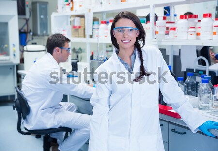 A woman vet petting a kitten with children Stock photo © wavebreak_media