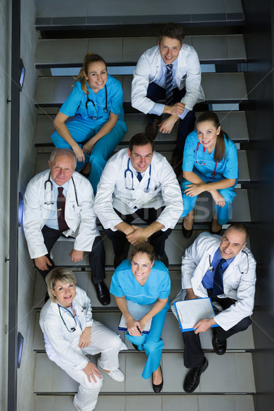High angle view of doctors and surgeons sitting on staircase Stock photo © wavebreak_media