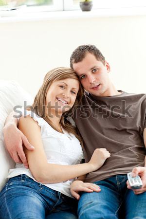 Man taking his wife temperature with a thermometer  Stock photo © wavebreak_media