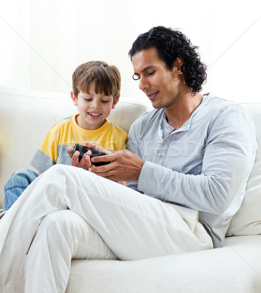 Gondoskodó apa fia ül kanapé otthon család Stock fotó © wavebreak_media