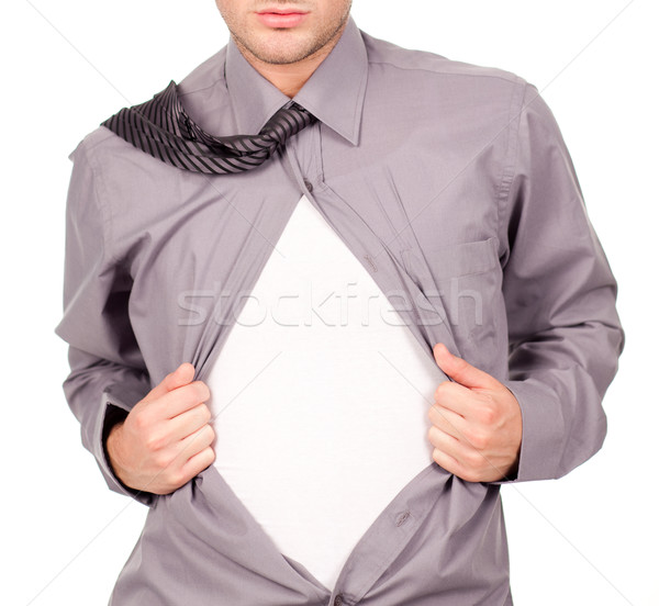 young attractive man pulling at his t-shirt Stock photo © wavebreak_media