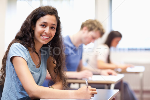 Gelukkig schrijven klas vrouw onderwijs Stockfoto © wavebreak_media