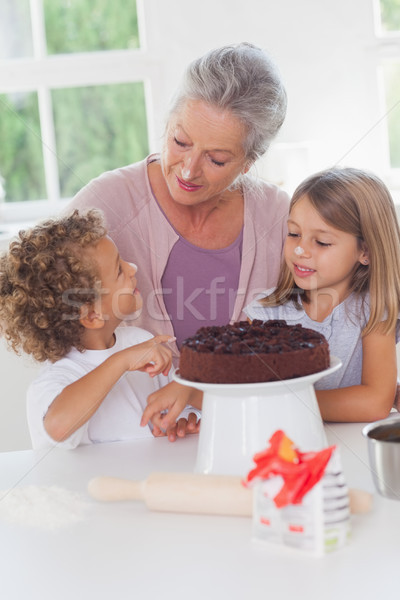 Children making cake with granny Stock photo © wavebreak_media