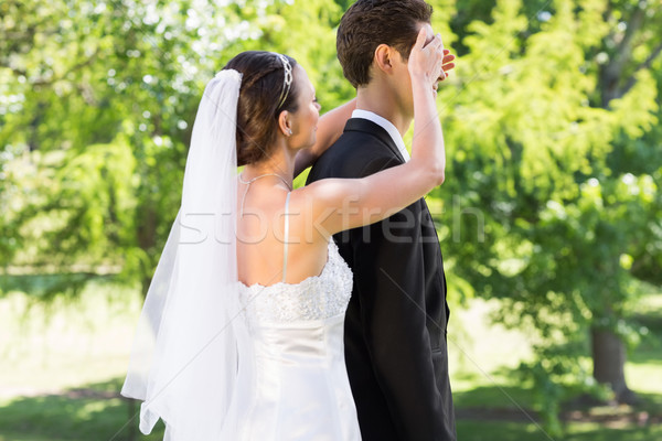 Stockfoto: Jonge · bruid · ogen · bruidegom · tuin · zijaanzicht