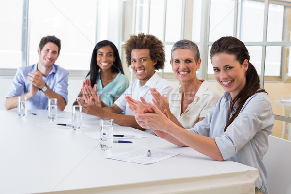 Stock photo: Attractive business people at business meeting