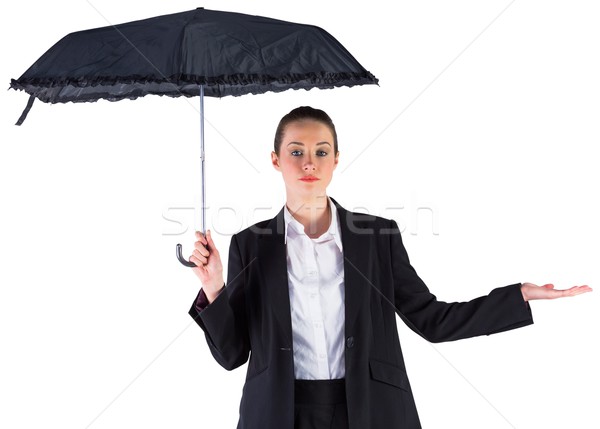 Geschäftsfrau halten schwarz Dach weiß Hand Stock foto © wavebreak_media