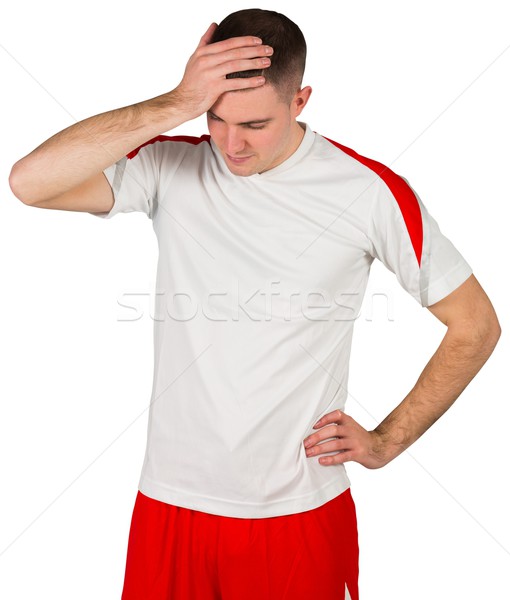 Csalódott futballista lefelé néz fehér futball viselet Stock fotó © wavebreak_media