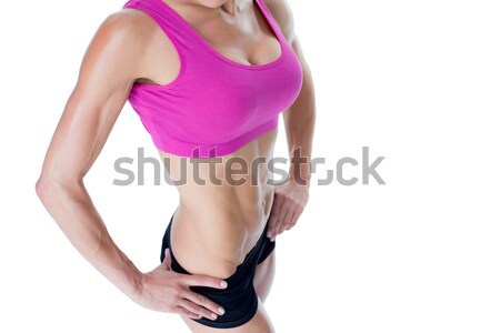 Weiblichen Bodybuilder posiert rosa Sport BH Stock foto © wavebreak_media