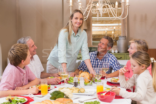 Nő adag karácsony vacsora család családi otthon Stock fotó © wavebreak_media