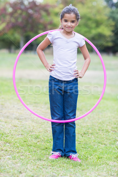 happy girl playing with hula hoops Stock photo © wavebreak_media